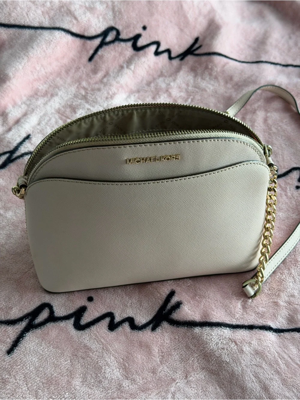 Authentic Michael Kors crossbody bag in a pink Saffiano leather